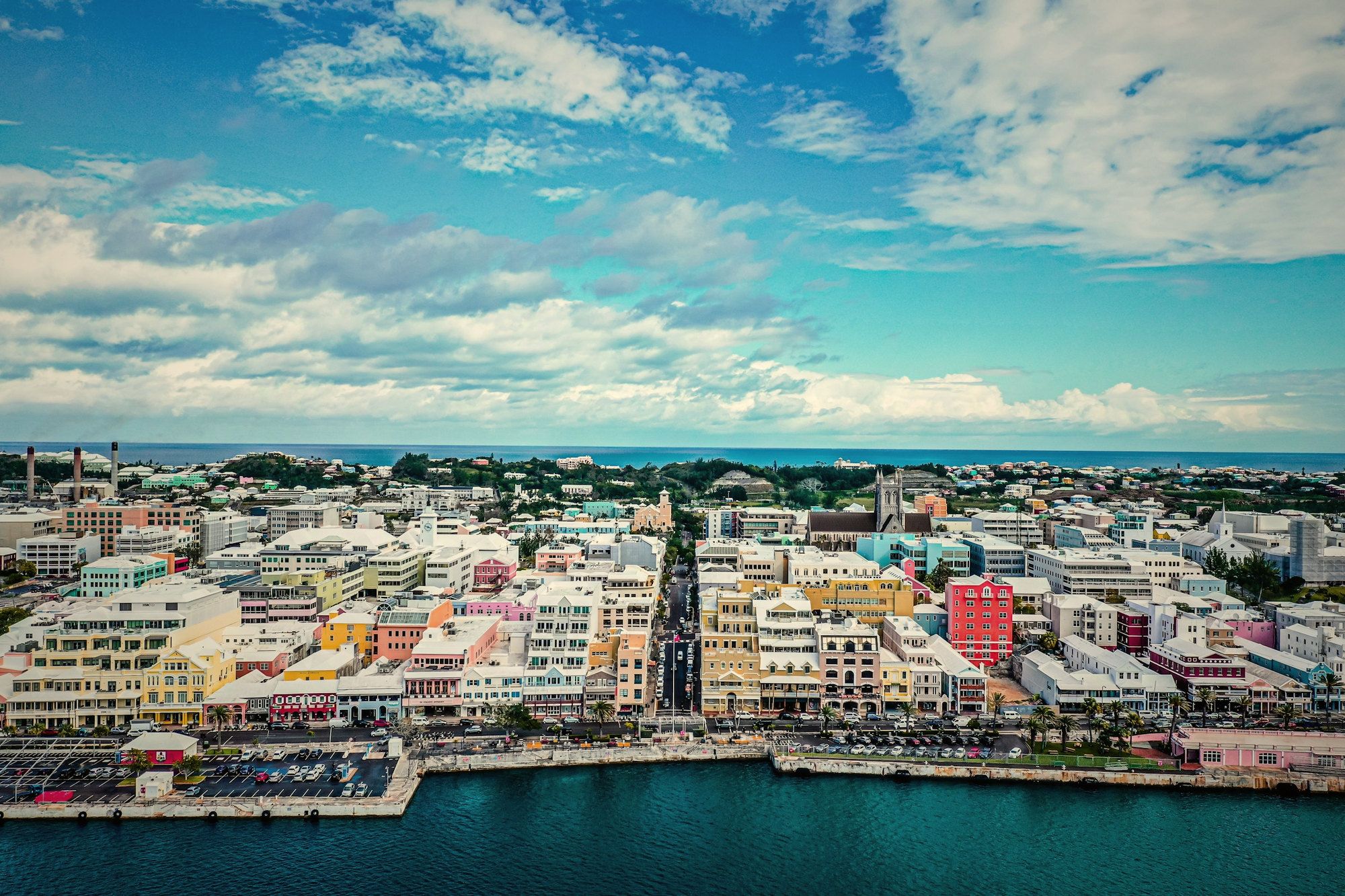 An island harbor and waterfront from above